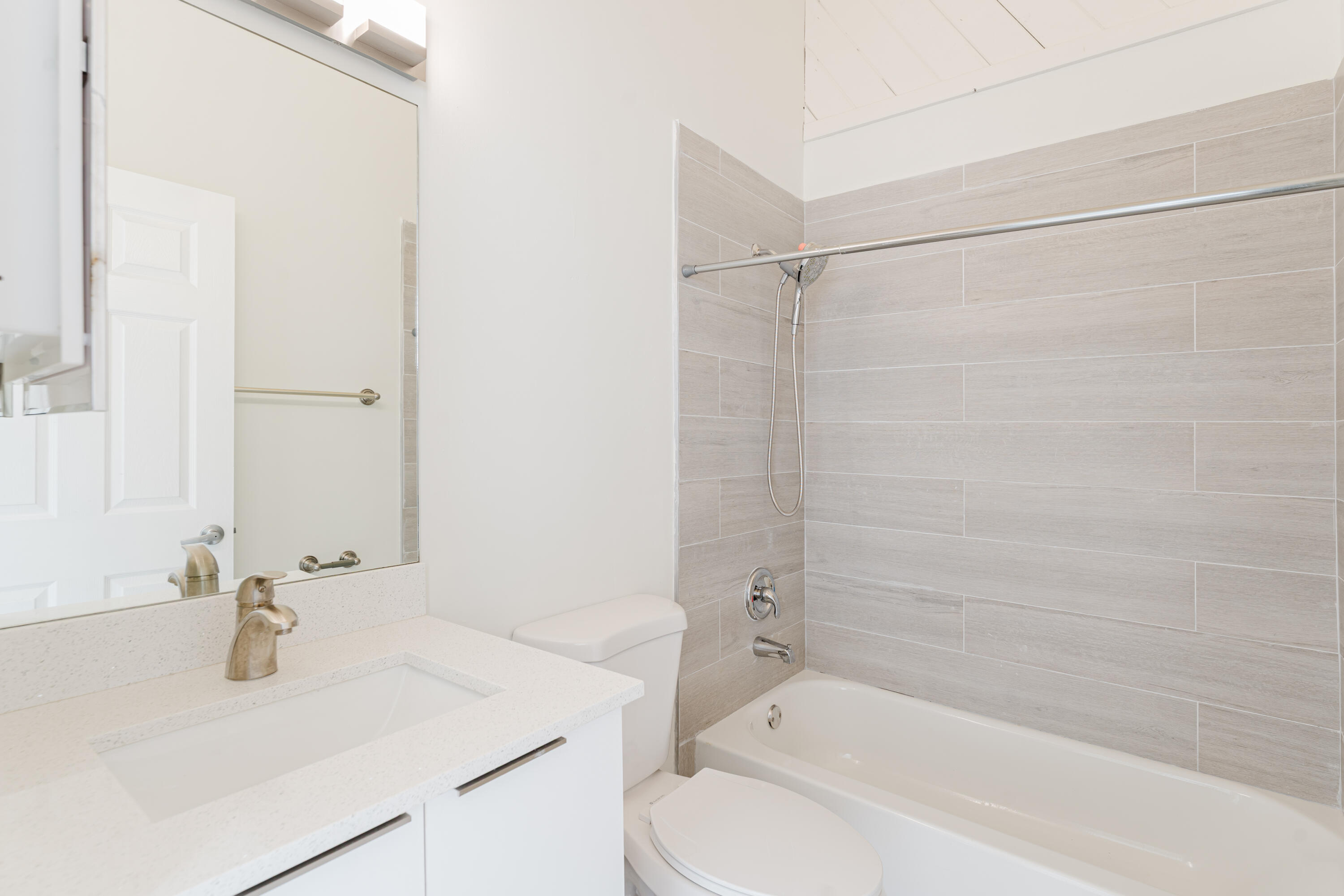 665 Jeffery Street Boca Raton, FL 33487 - Photo 25 of 44 a bathroom with a sink and a mirror