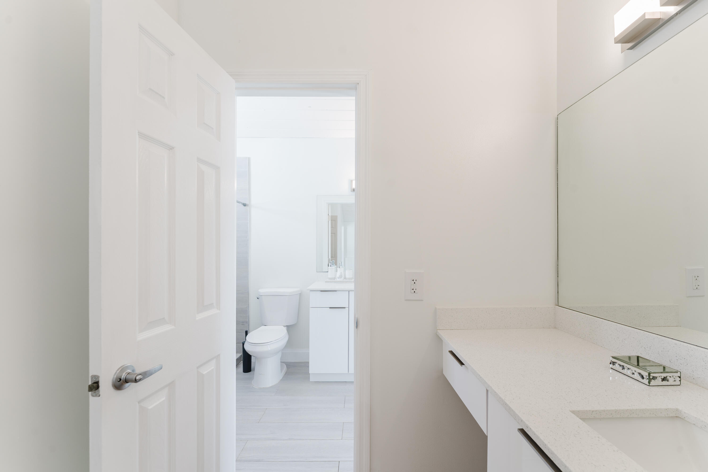 665 Jeffery Street Boca Raton, FL 33487 - Photo 33 of 44 a bathroom with a sink and a toilet