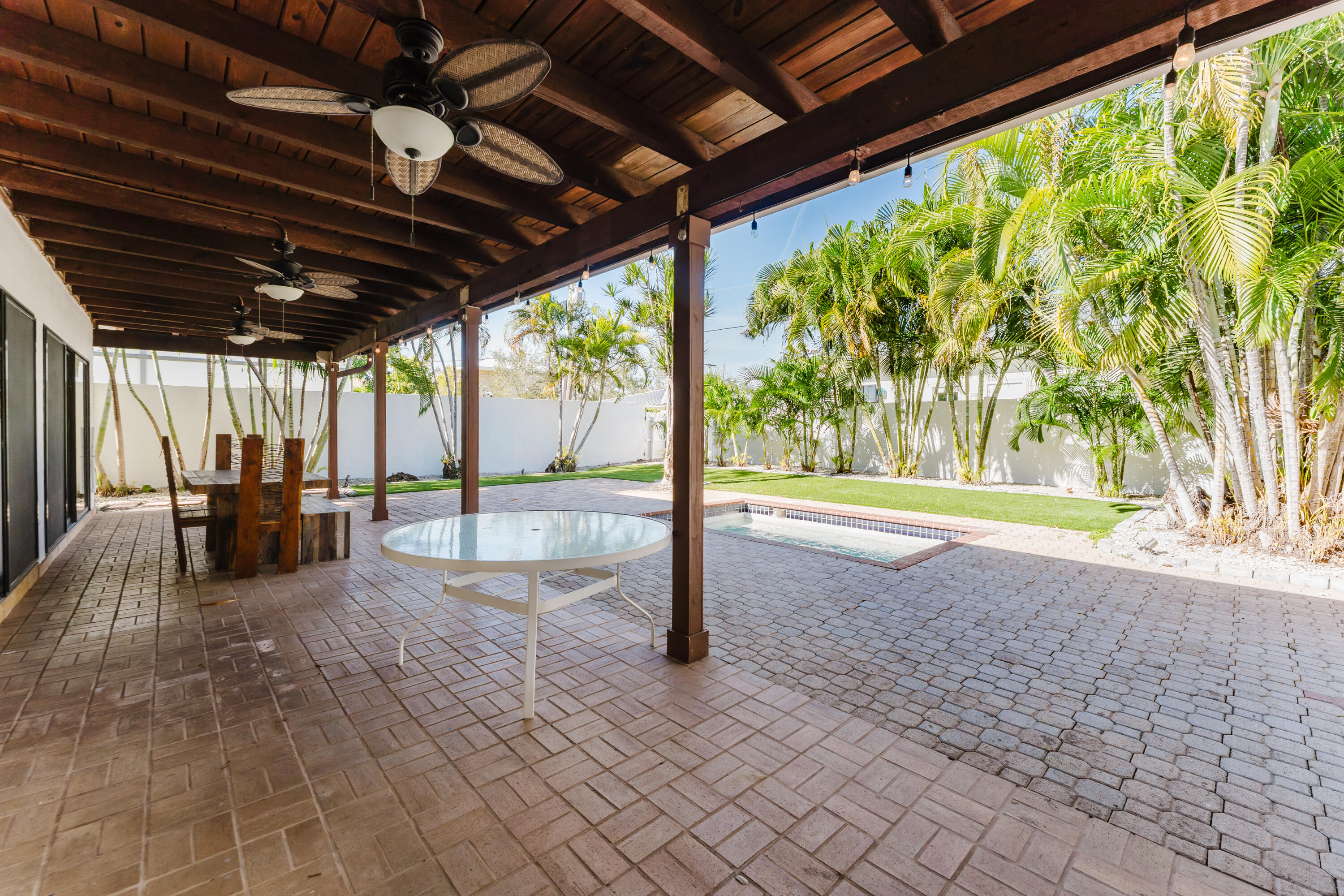 665 Jeffery Street Boca Raton, FL 33487 - Photo 40 of 44 a view of a backyard