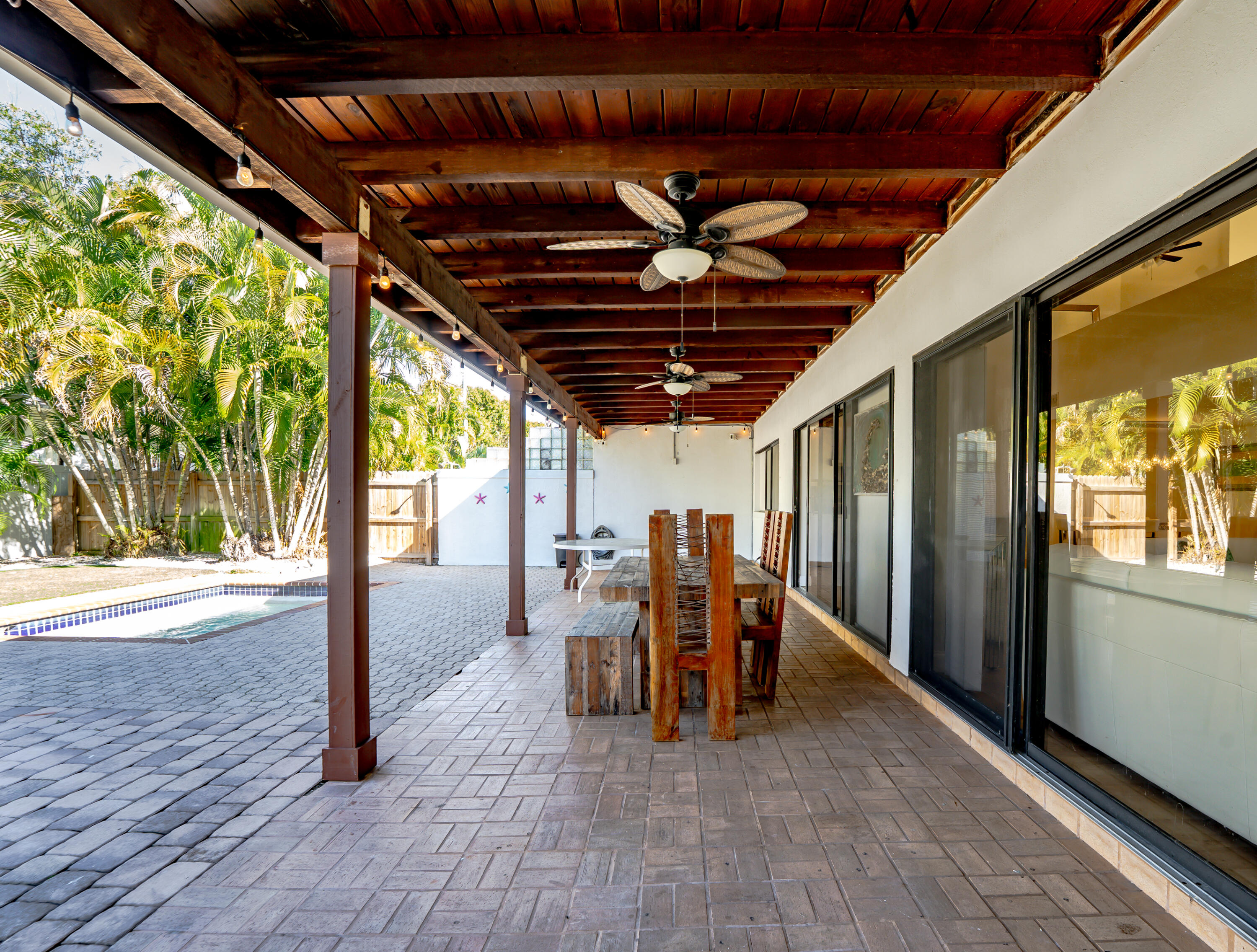 665 Jeffery Street Boca Raton, FL 33487 - Photo 44 of 44 a view of outdoor space with wooden floor and seating area