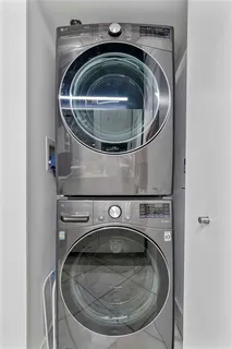 a utility room with washer and dryer