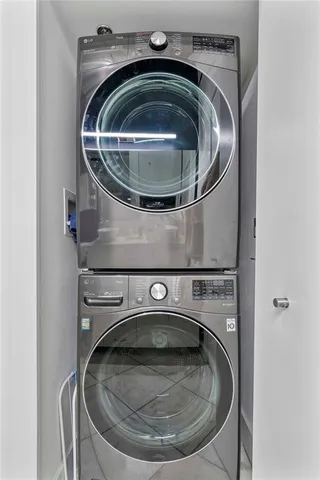a utility room with washer and dryer