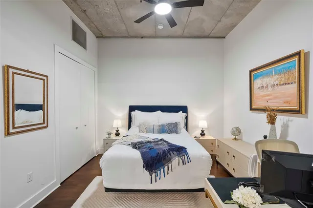 a large white bed in a white room