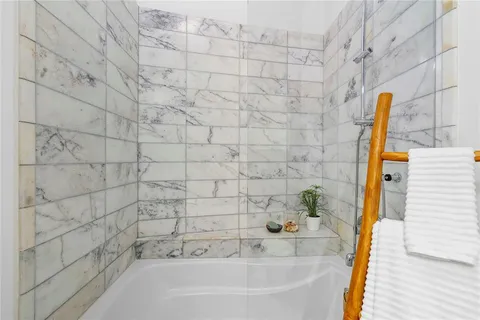 a bathroom with a bathtub