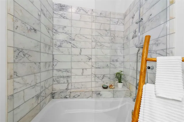 a bathroom with a bathtub