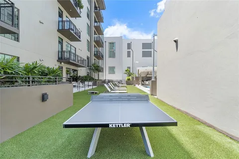 a kitchen with a sink and appliances