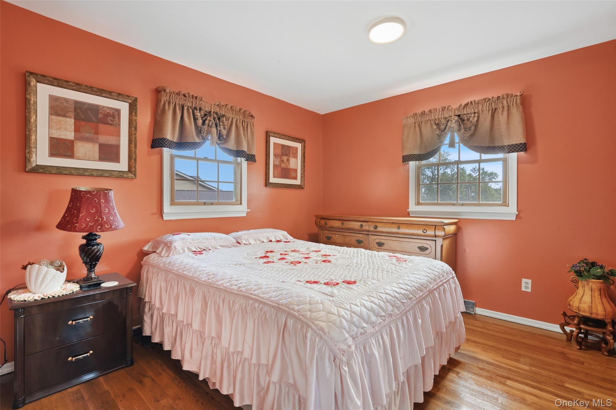 623 Cardinal Road Cortlandt Manor, NY 10567 - Photo 17 of 40 a bedroom with a bed and a dresser