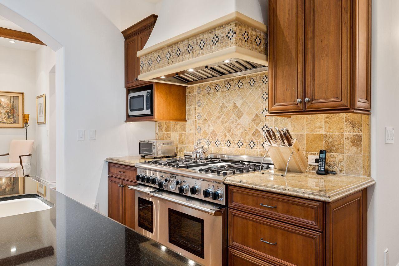 492 Monarch Lane Montecito, CA 93108 - Photo 12 of 58 a kitchen with a stove and a sink