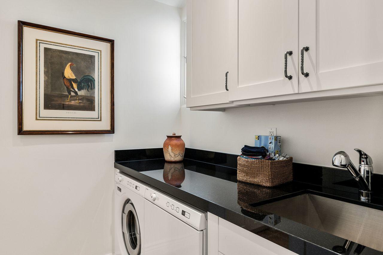492 Monarch Lane Montecito, CA 93108 - Photo 19 of 58 a kitchen with a sink and cabinets