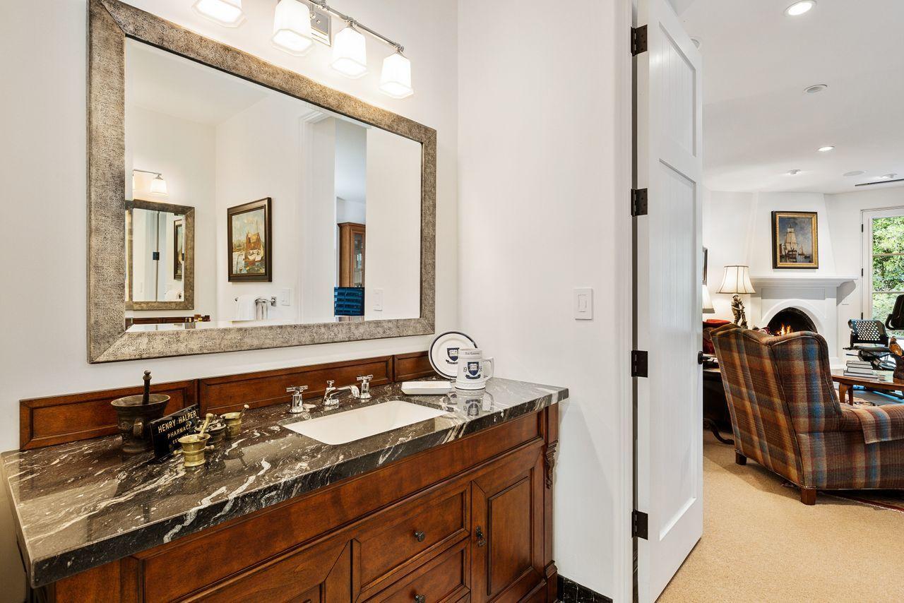 492 Monarch Lane Montecito, CA 93108 - Photo 24 of 58 a bathroom with a sink and a mirror