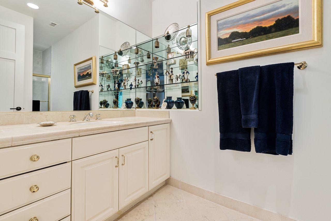 492 Monarch Lane Montecito, CA 93108 - Photo 27 of 58 a bathroom with a sink vanity and mirror