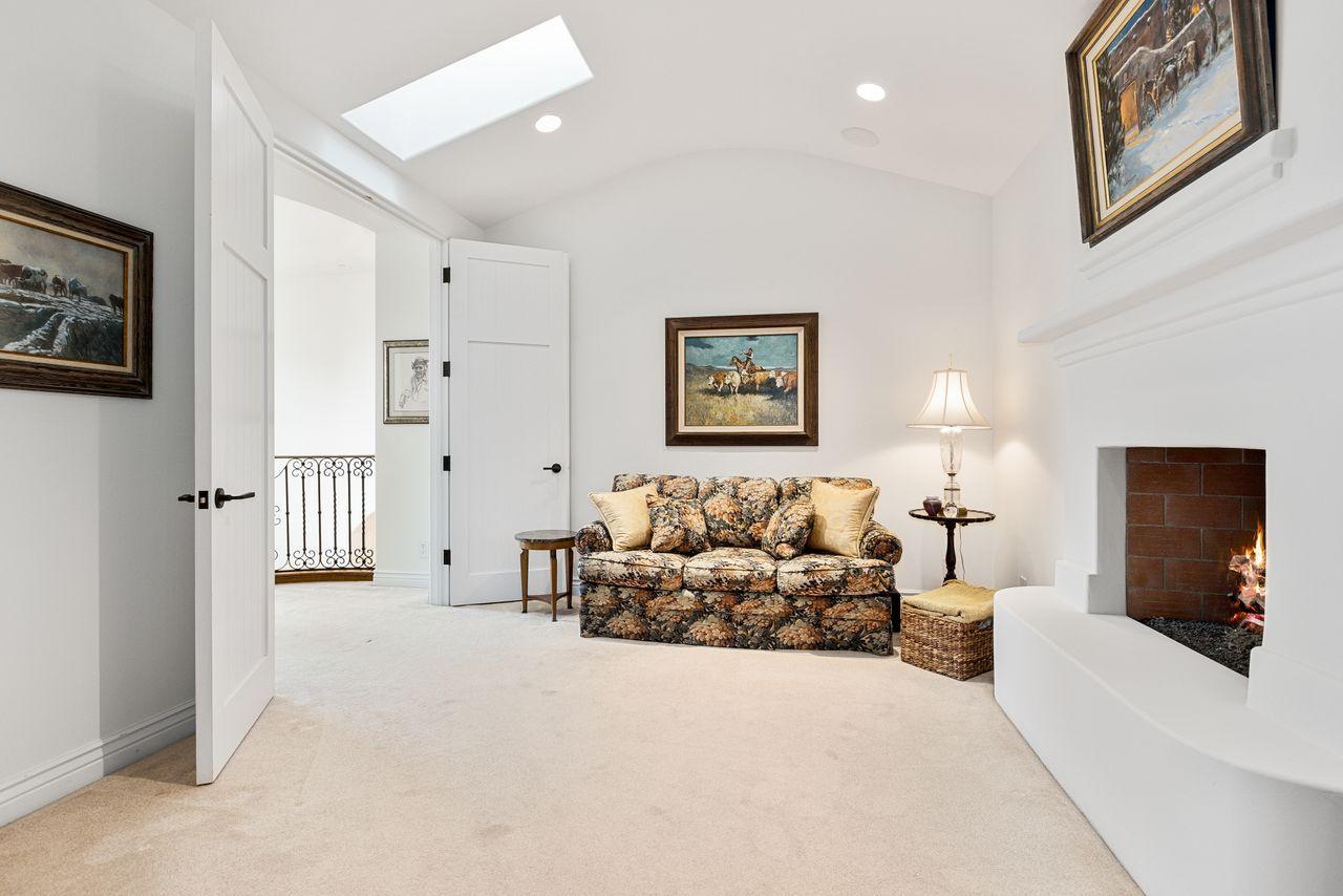 492 Monarch Lane Montecito, CA 93108 - Photo 30 of 58 a living room with furniture and a flat screen tv