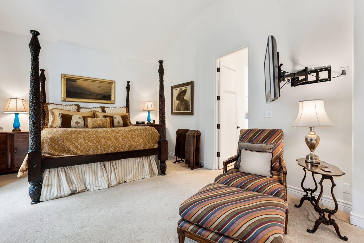 492 Monarch Lane Montecito, CA 93108 - Photo 31 of 58 a bedroom with a bed and flat screen tv