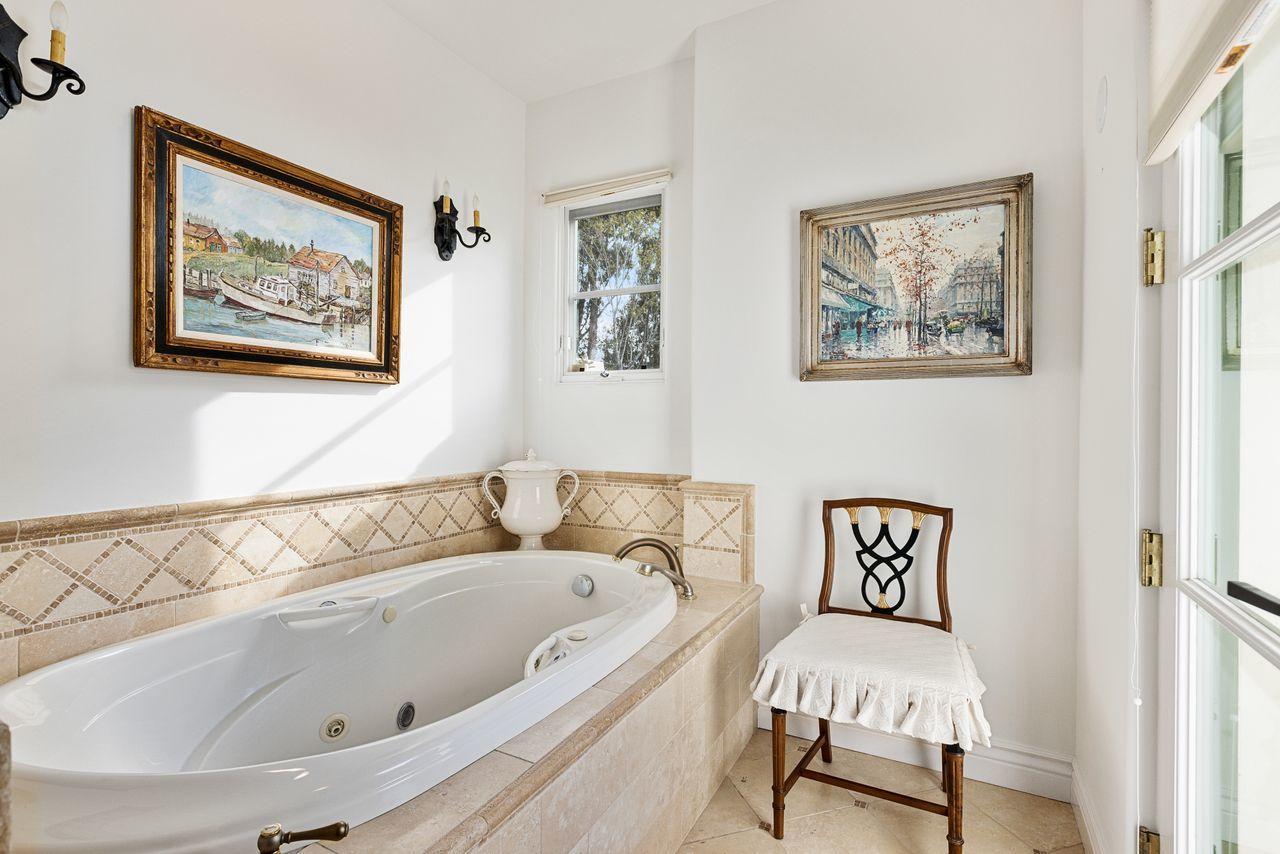 492 Monarch Lane Montecito, CA 93108 - Photo 34 of 58 a bathroom with a tub and a shower