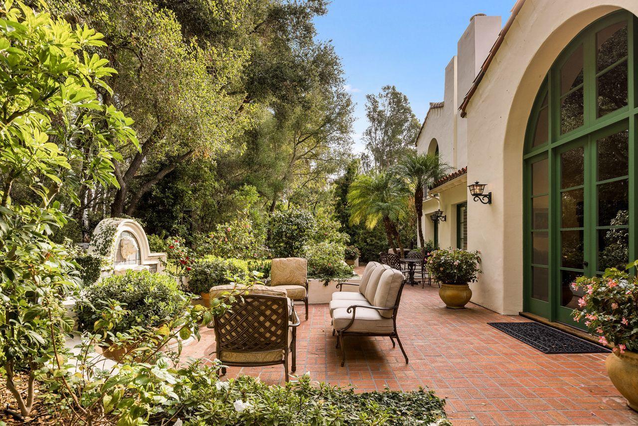 492 Monarch Lane Montecito, CA 93108 - Photo 41 of 58 a view of a patio with couches table and chairs and potted plants