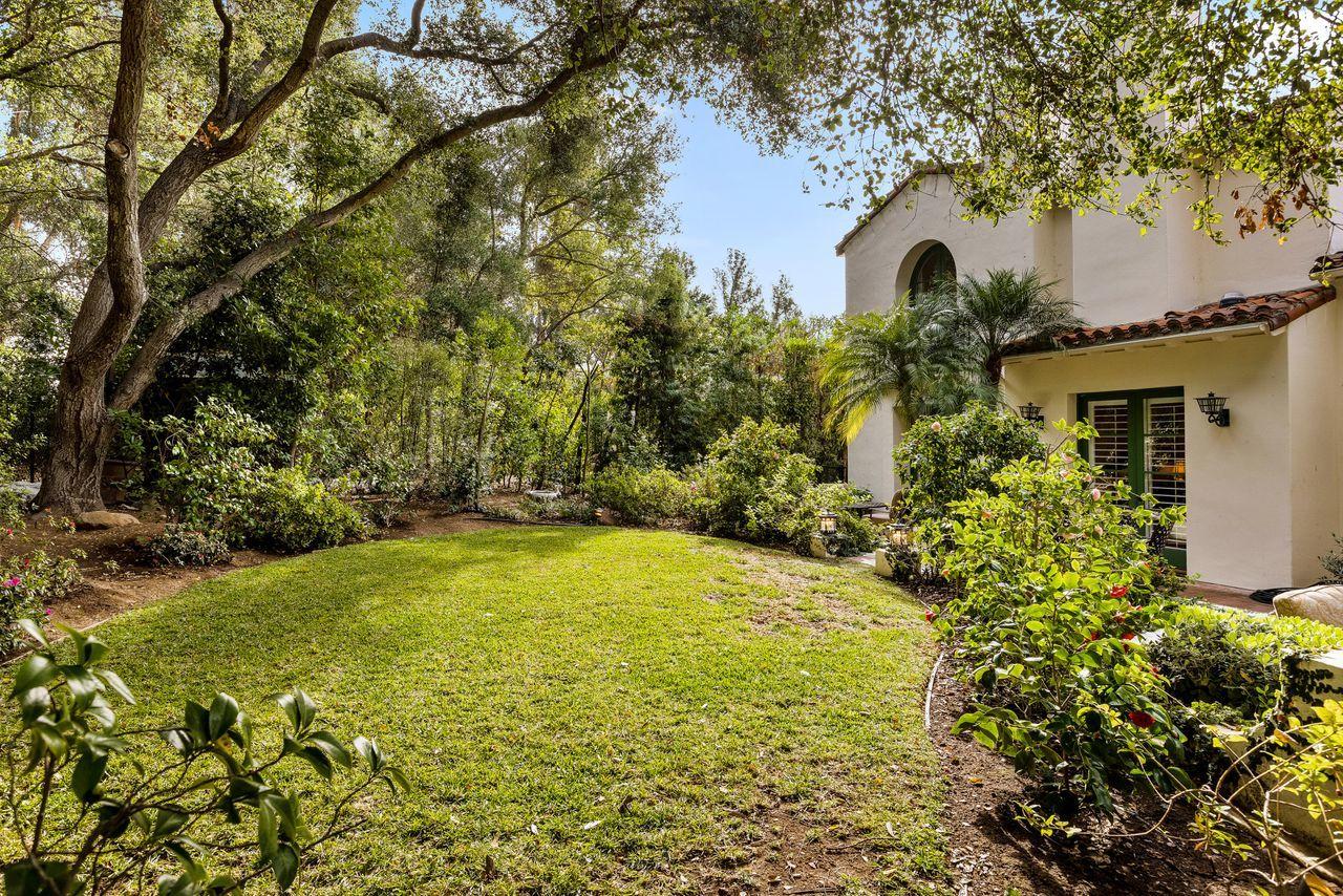 492 Monarch Lane Montecito, CA 93108 - Photo 42 of 58 a front view of a house with a yard