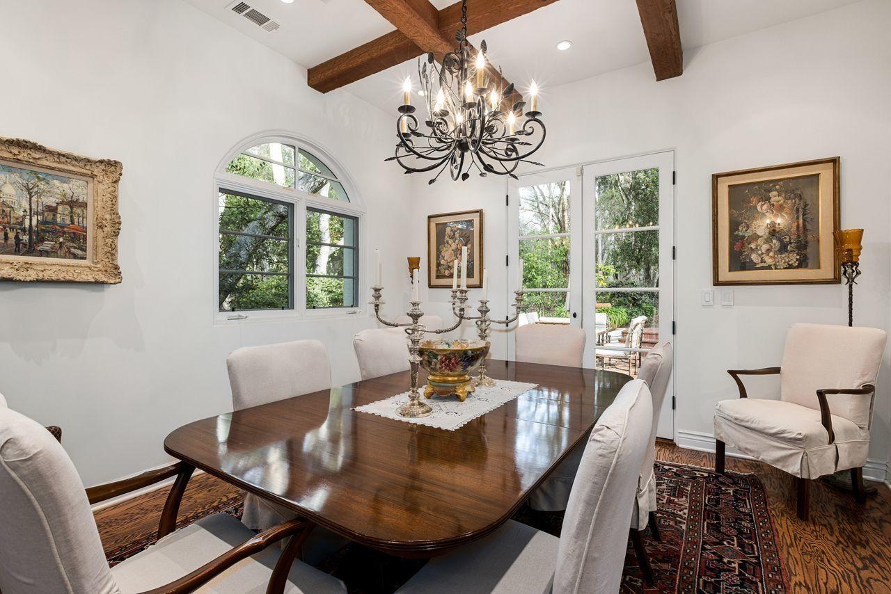 492 Monarch Lane Montecito, CA 93108 - Photo 9 of 58 a view of a dining room with furniture a chandelier and wooden floor