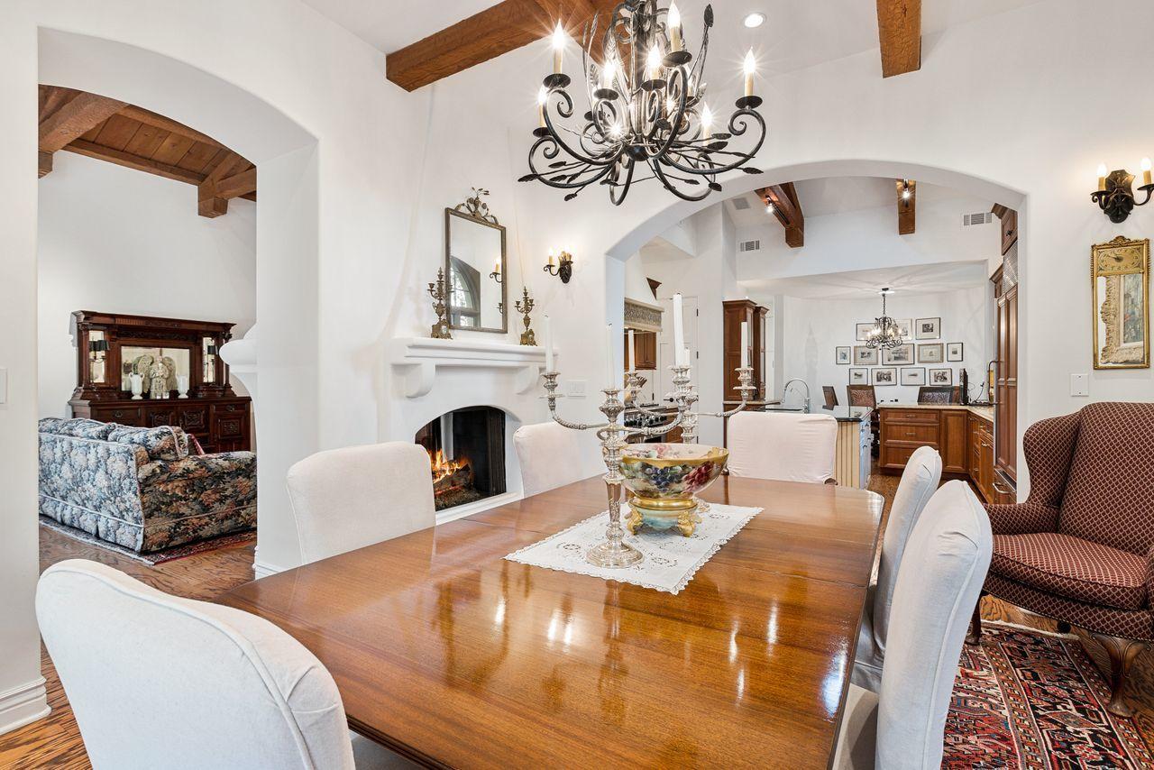 492 Monarch Lane Montecito, CA 93108 - Photo 10 of 58 a living room with furniture a chandelier and a fireplace