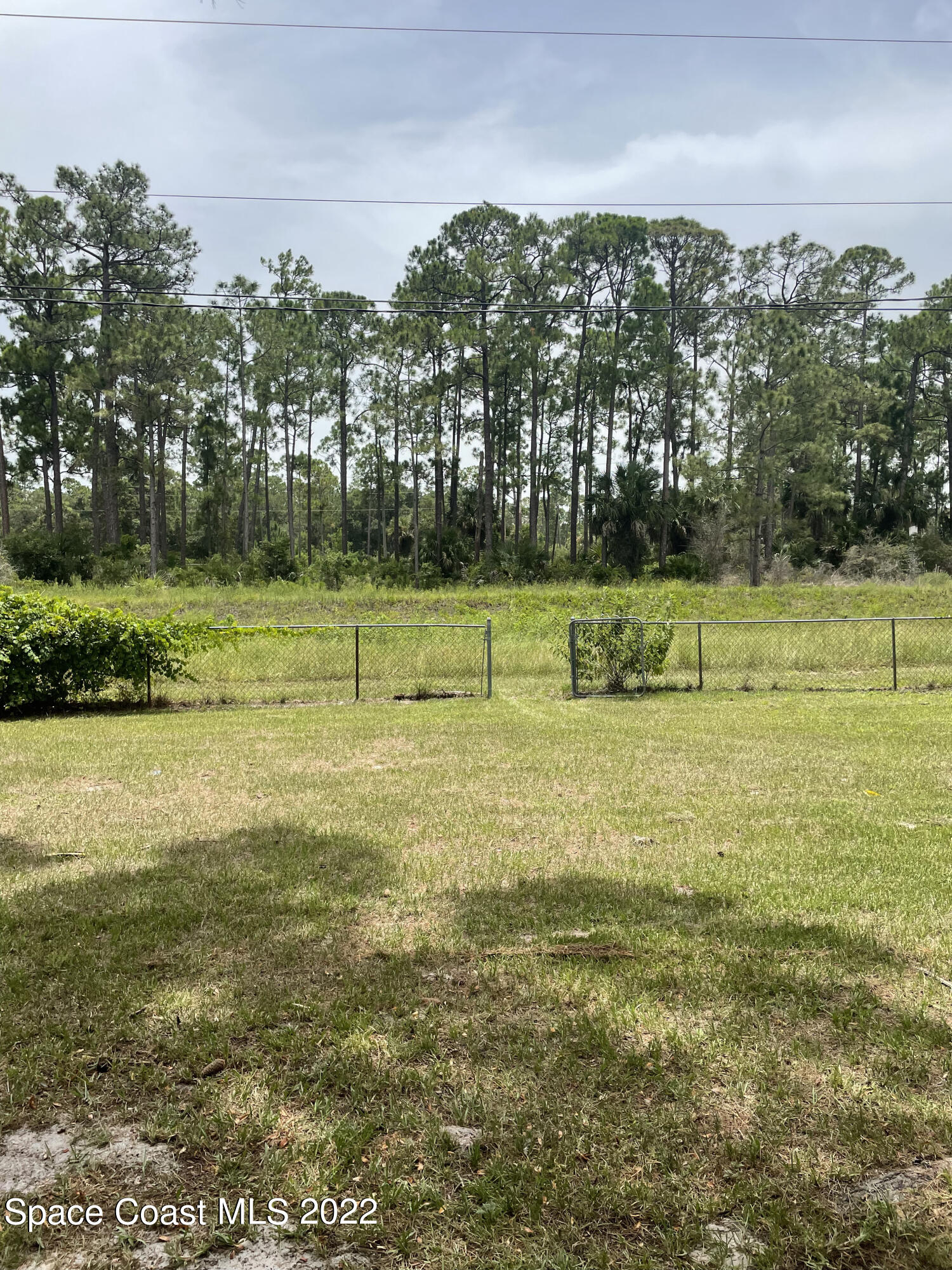 590 Rheine Road Northwest Palm Bay, FL 32907 - Photo 4 of 19 a view of a swimming pool