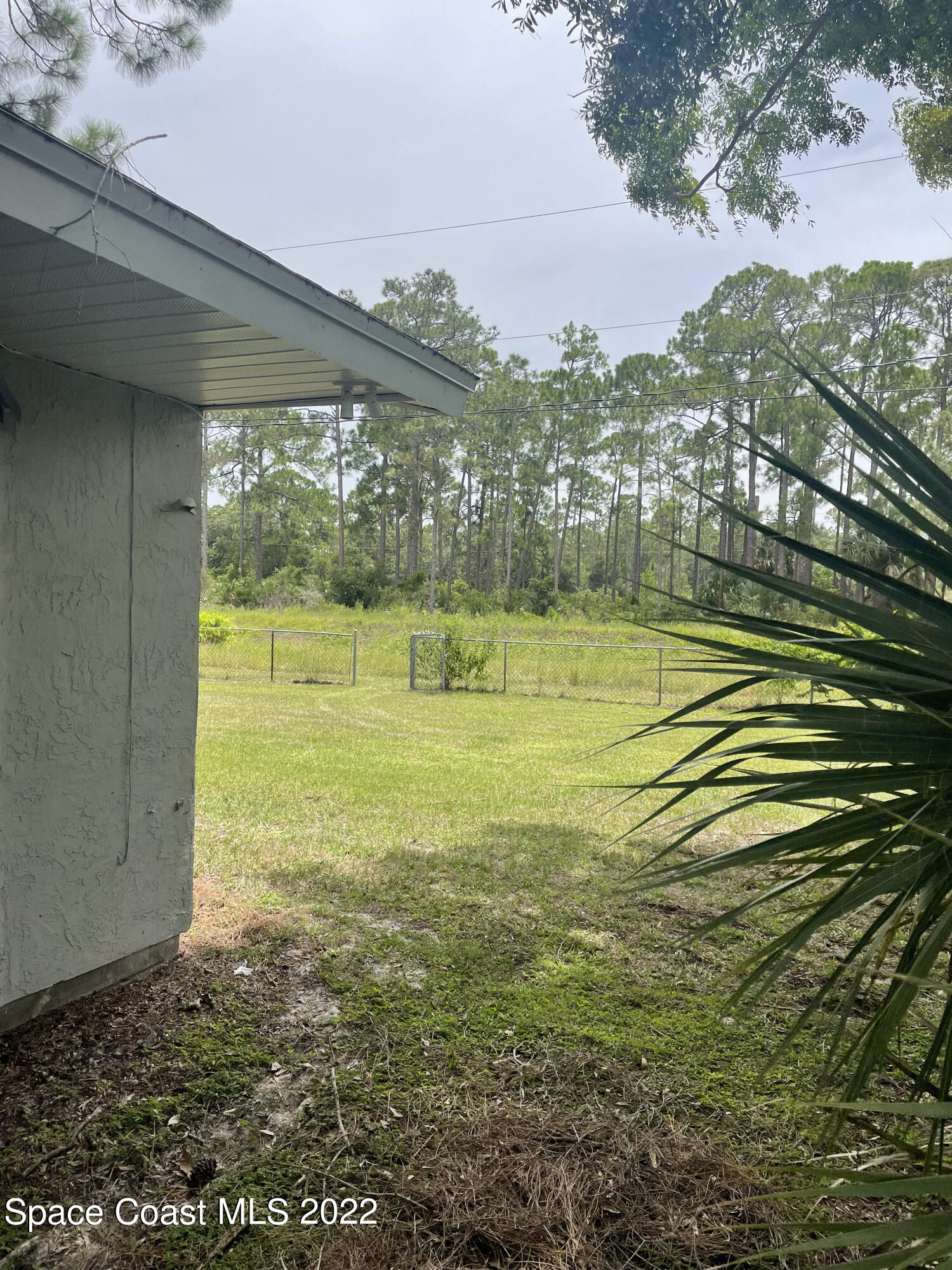 590 Rheine Road Northwest Palm Bay, FL 32907 - Photo 6 of 19 a view of a large body of water with a building in the background
