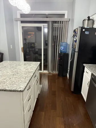 a bathroom with sink and mirror
