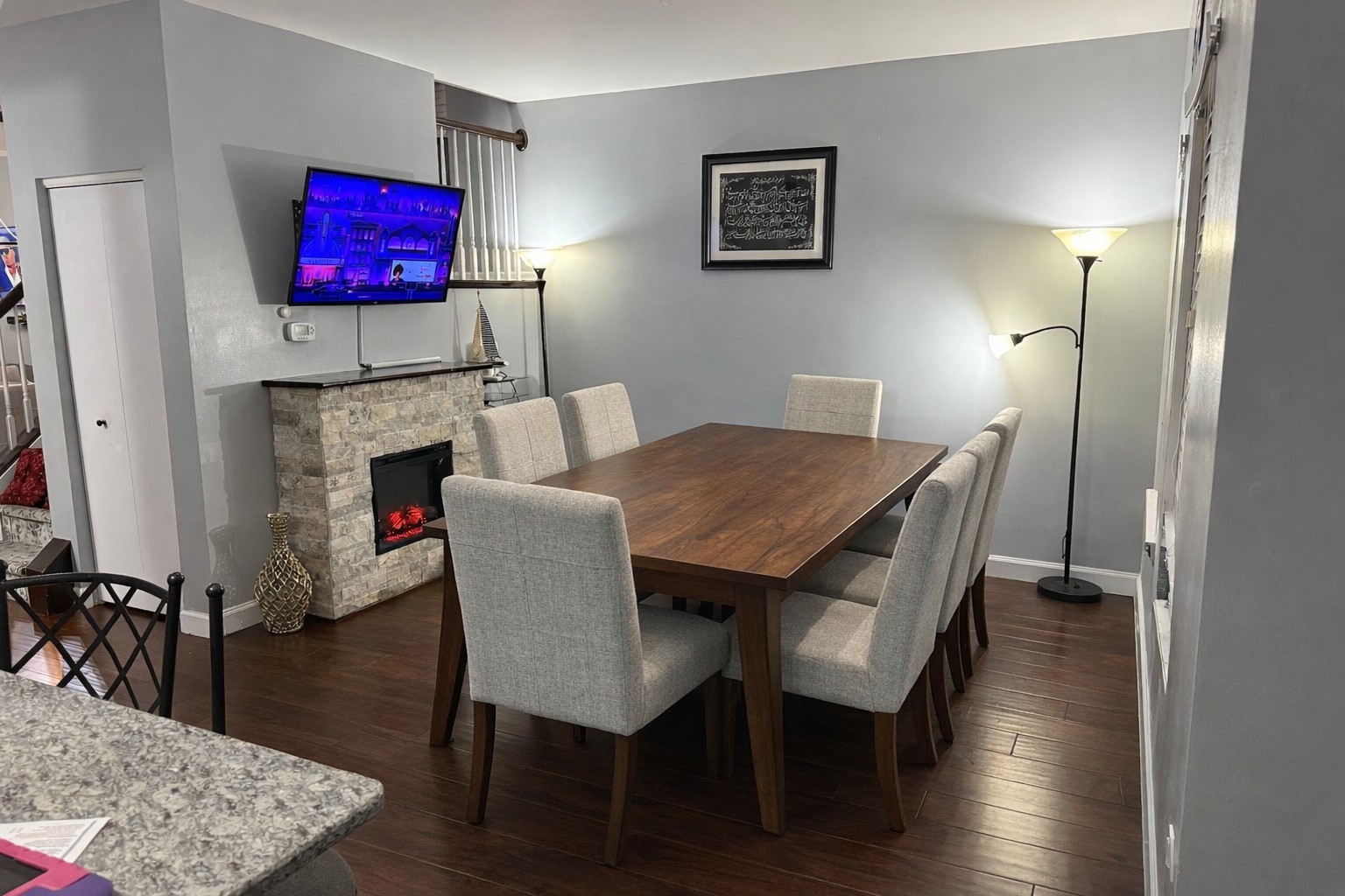 689 Shannon Drive Romeoville, IL 60446 - Photo 9 of 24 a view of a dining room with furniture and wooden floor