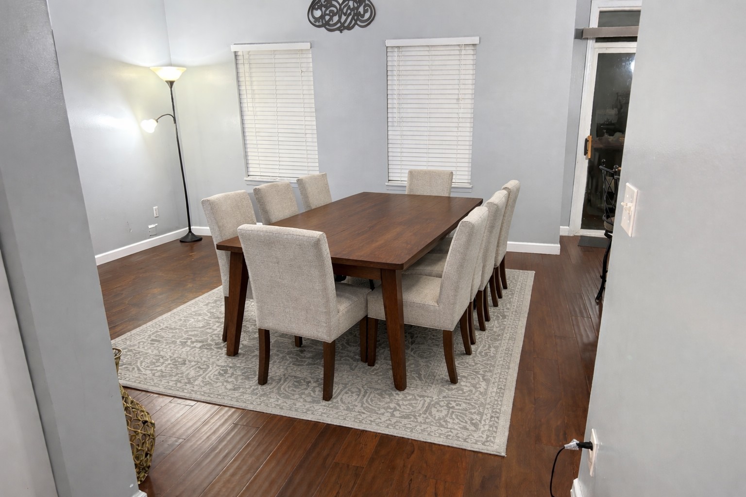 689 Shannon Drive Romeoville, IL 60446 - Photo 10 of 24 a view of a dining room with furniture and wooden floor