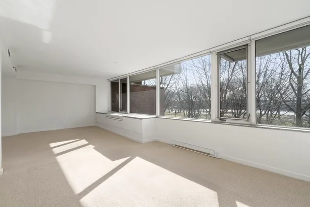 a view of a big room with closet and cabinet