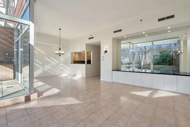 a view of gallery with windows