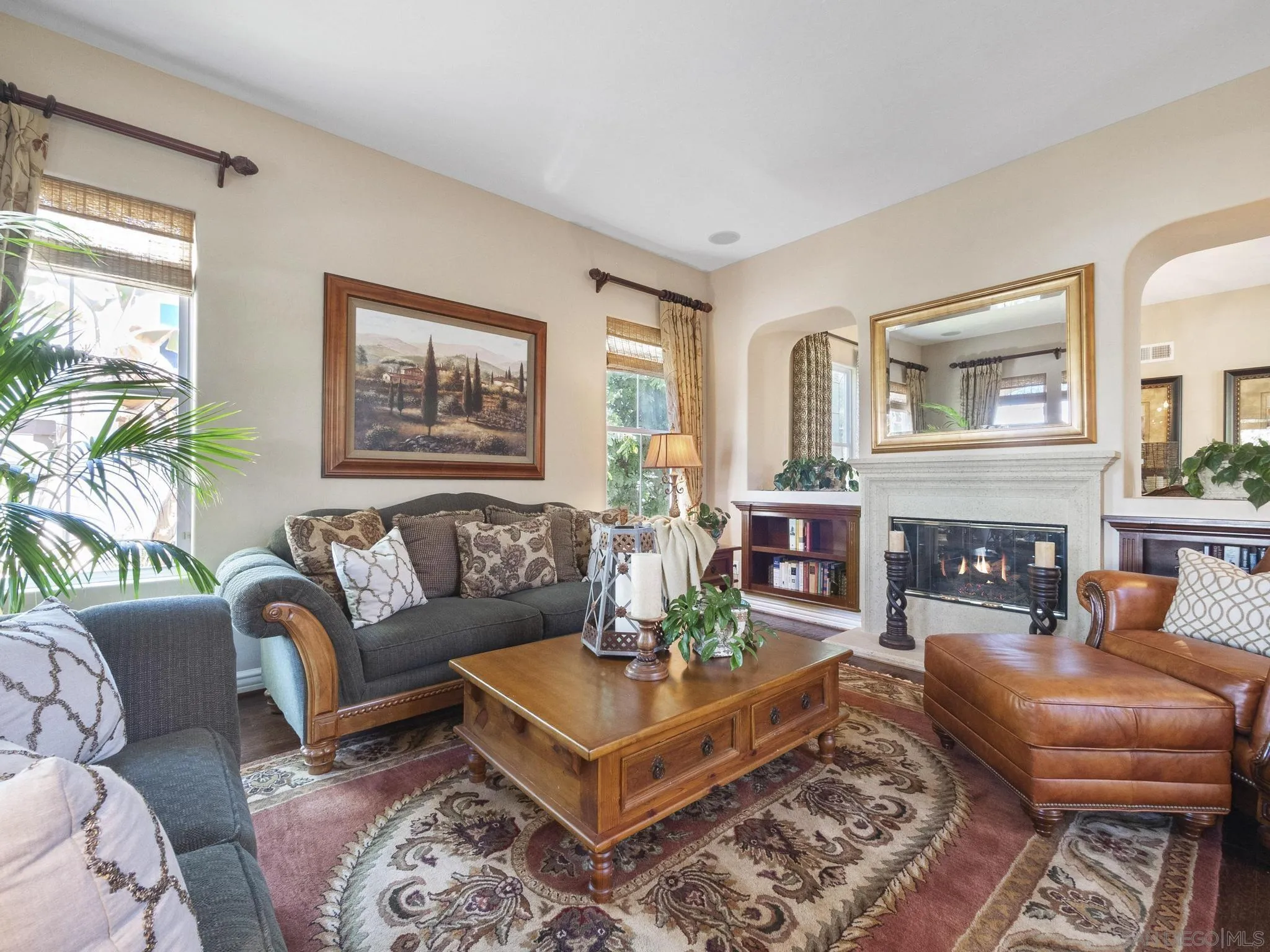 14636 Rio Rancho San Diego, CA 92127 - Photo 11 of 61 a living room with furniture fireplace and a window
