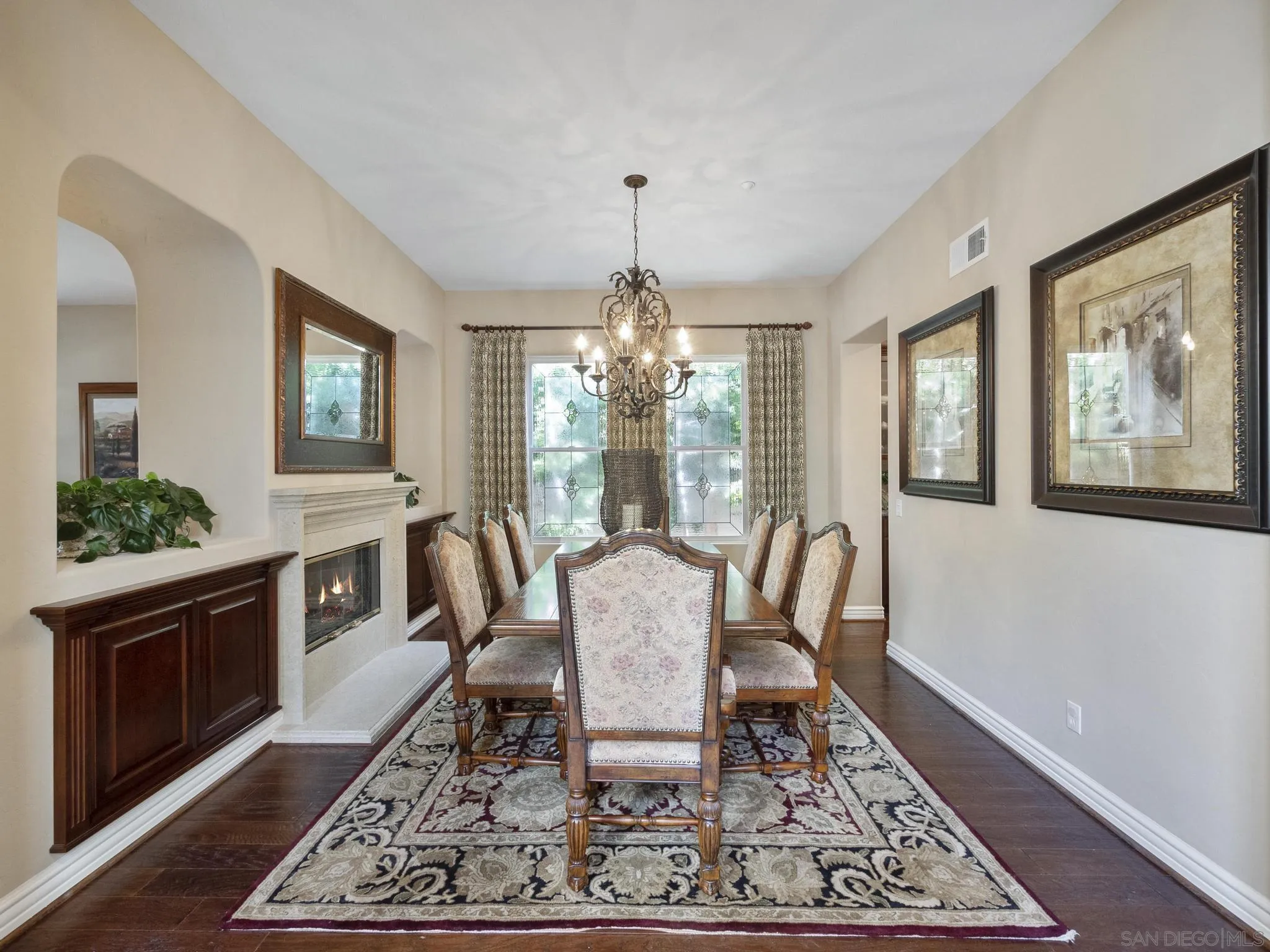 14636 Rio Rancho San Diego, CA 92127 - Photo 12 of 61 a view of a dining room with furniture window and wooden floor