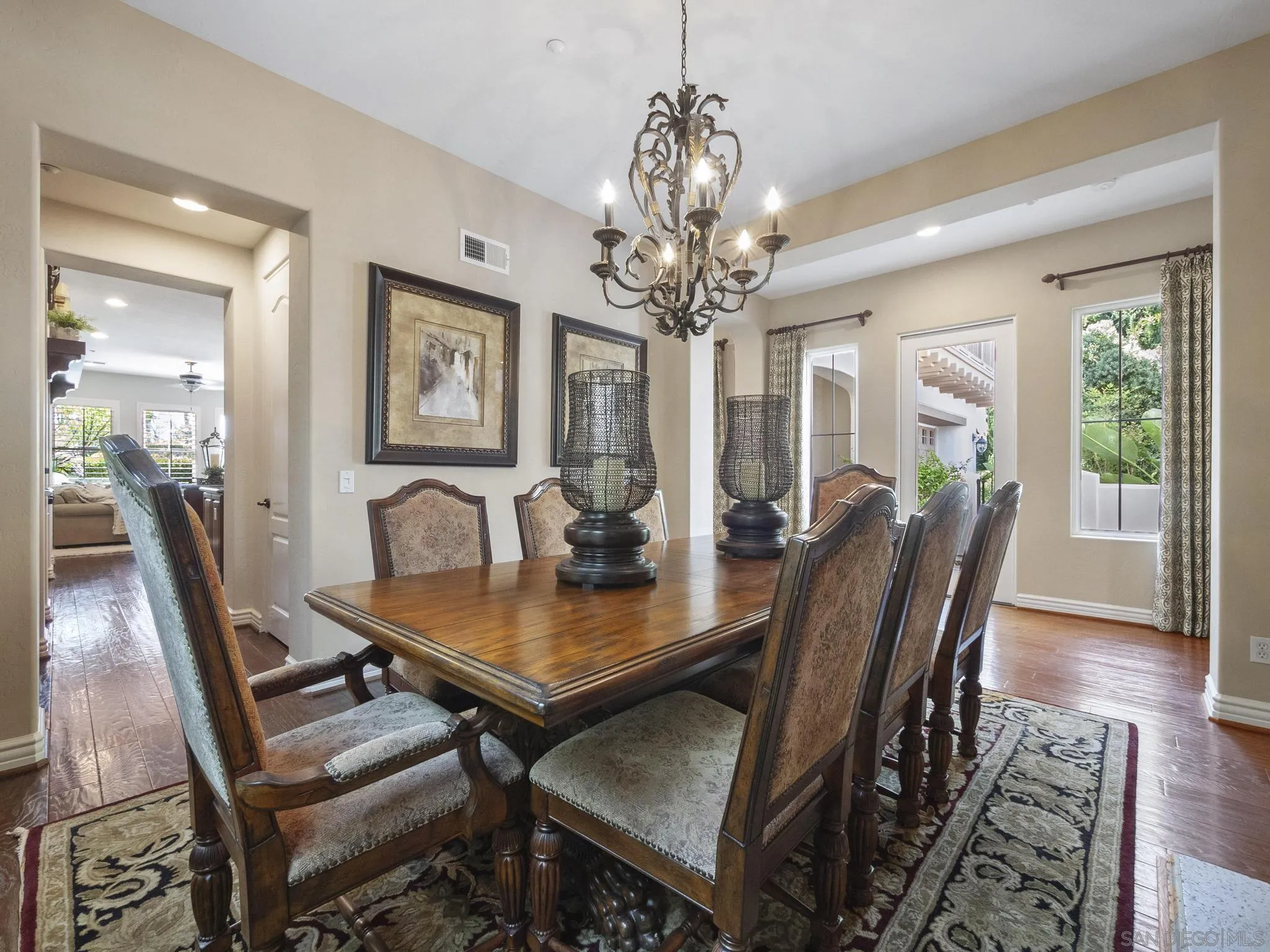 14636 Rio Rancho San Diego, CA 92127 - Photo 13 of 61 a view of a dining room with furniture wooden floor and chandelier
