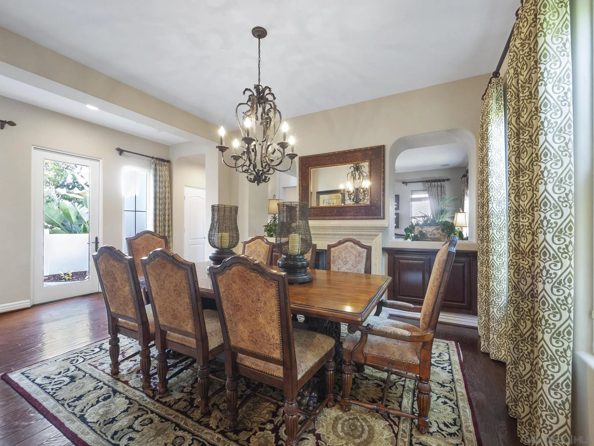 14636 Rio Rancho San Diego, CA 92127 - Photo 14 of 61 a view of a dining room with furniture and a chandelier