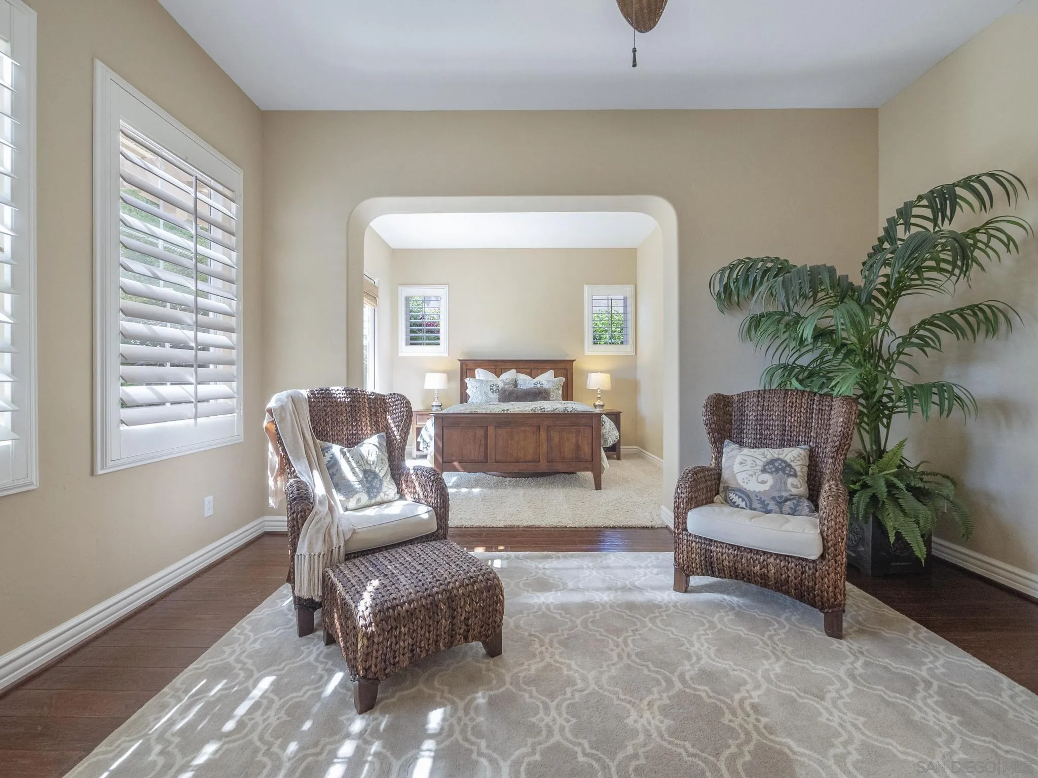 14636 Rio Rancho San Diego, CA 92127 - Photo 30 of 61 a living room with furniture and a potted plant