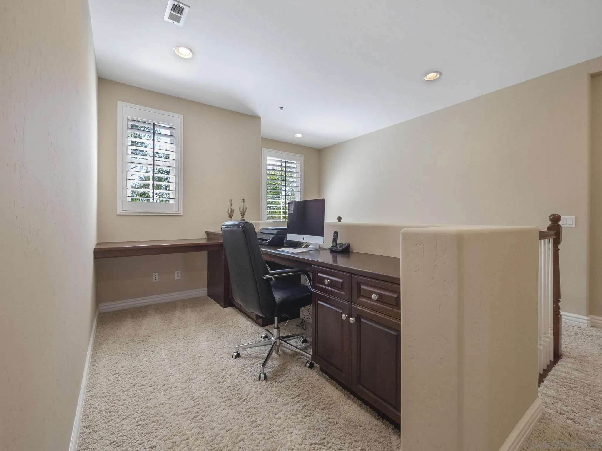 14636 Rio Rancho San Diego, CA 92127 - Photo 34 of 61 a view of a workspace with furniture and a window