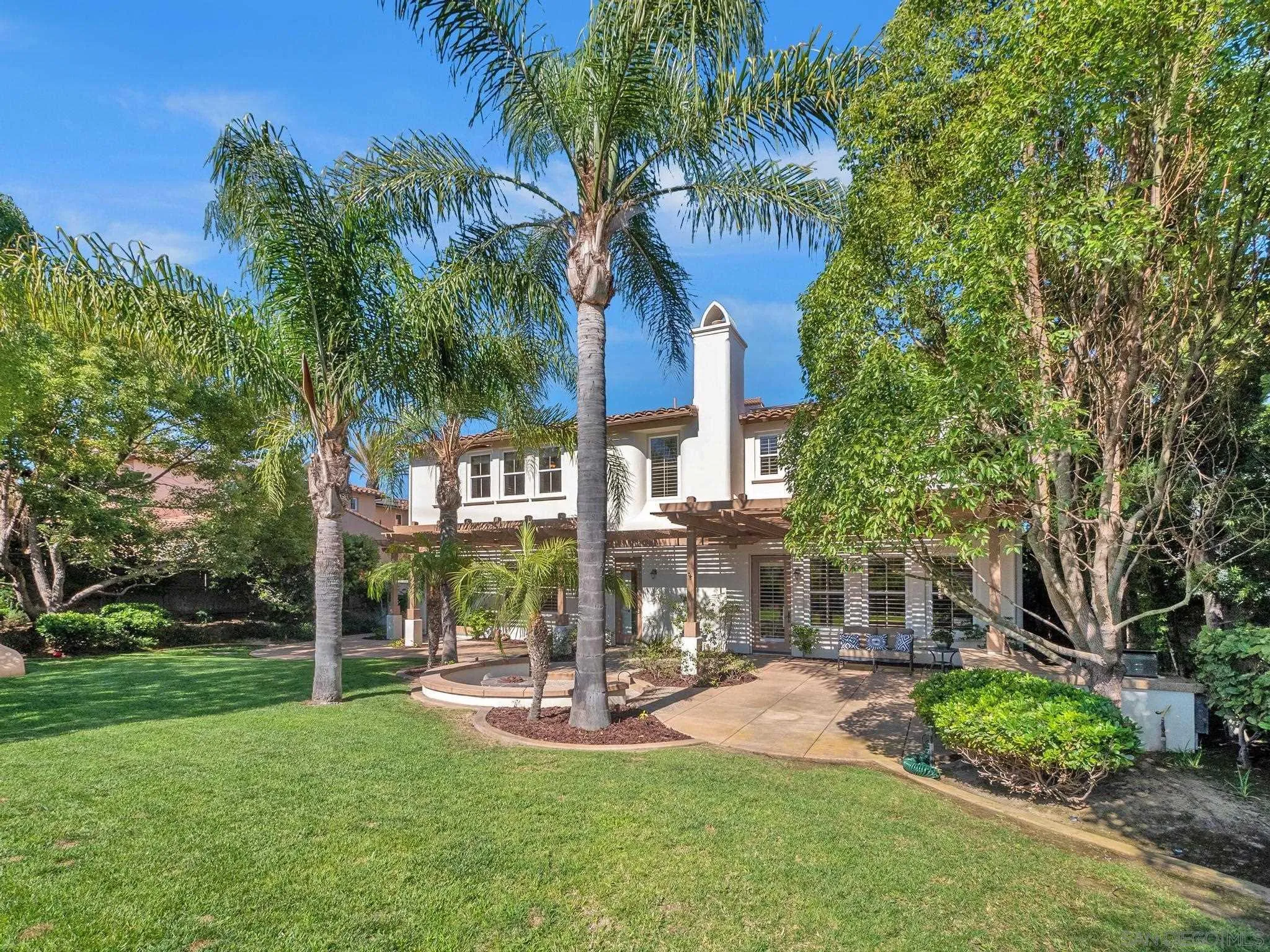 14636 Rio Rancho San Diego, CA 92127 - Photo 58 of 61 a view of a house with a yard patio and swimming pool