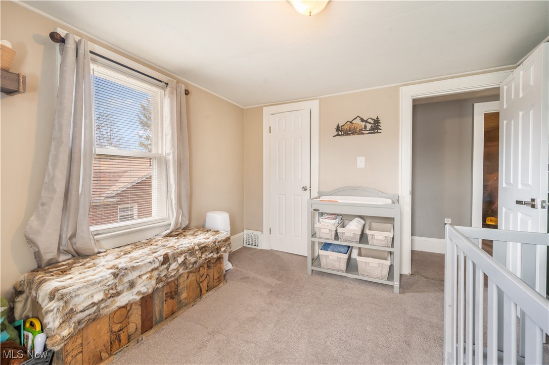 1615 Wooster Road West Barberton, OH 44203 - Photo 17 of 28 Bedroom featuring carpet and baseboards