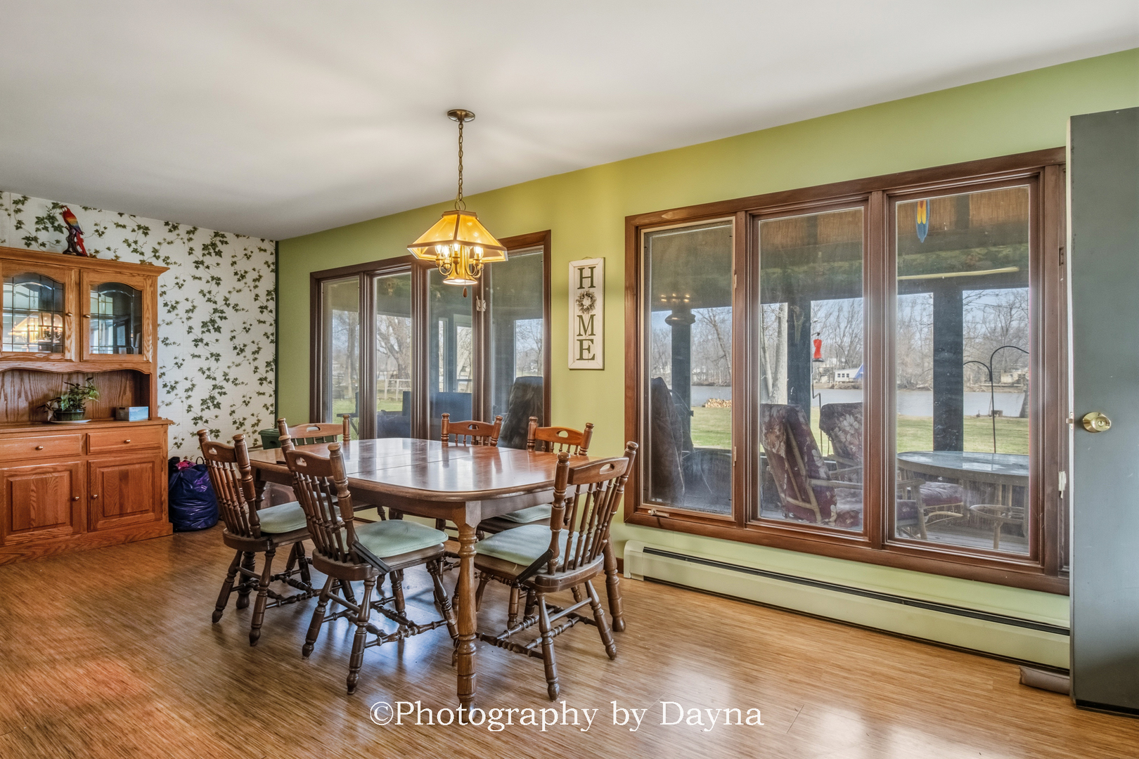 2857 River Road Kankakee, IL 60901 - Photo 6 of 35 a view of a dining room with furniture window and wooden floor