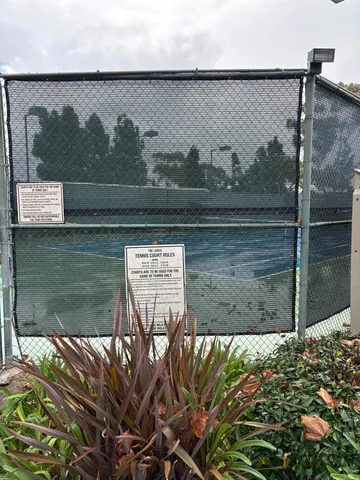 a view of a lake with a yard