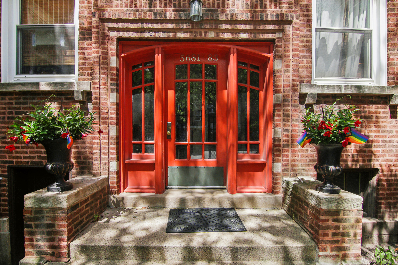 5683 North Ridge Avenue, Unit 2W Chicago, IL 60660 - Photo 2 of 23 a front view of a house with a porch