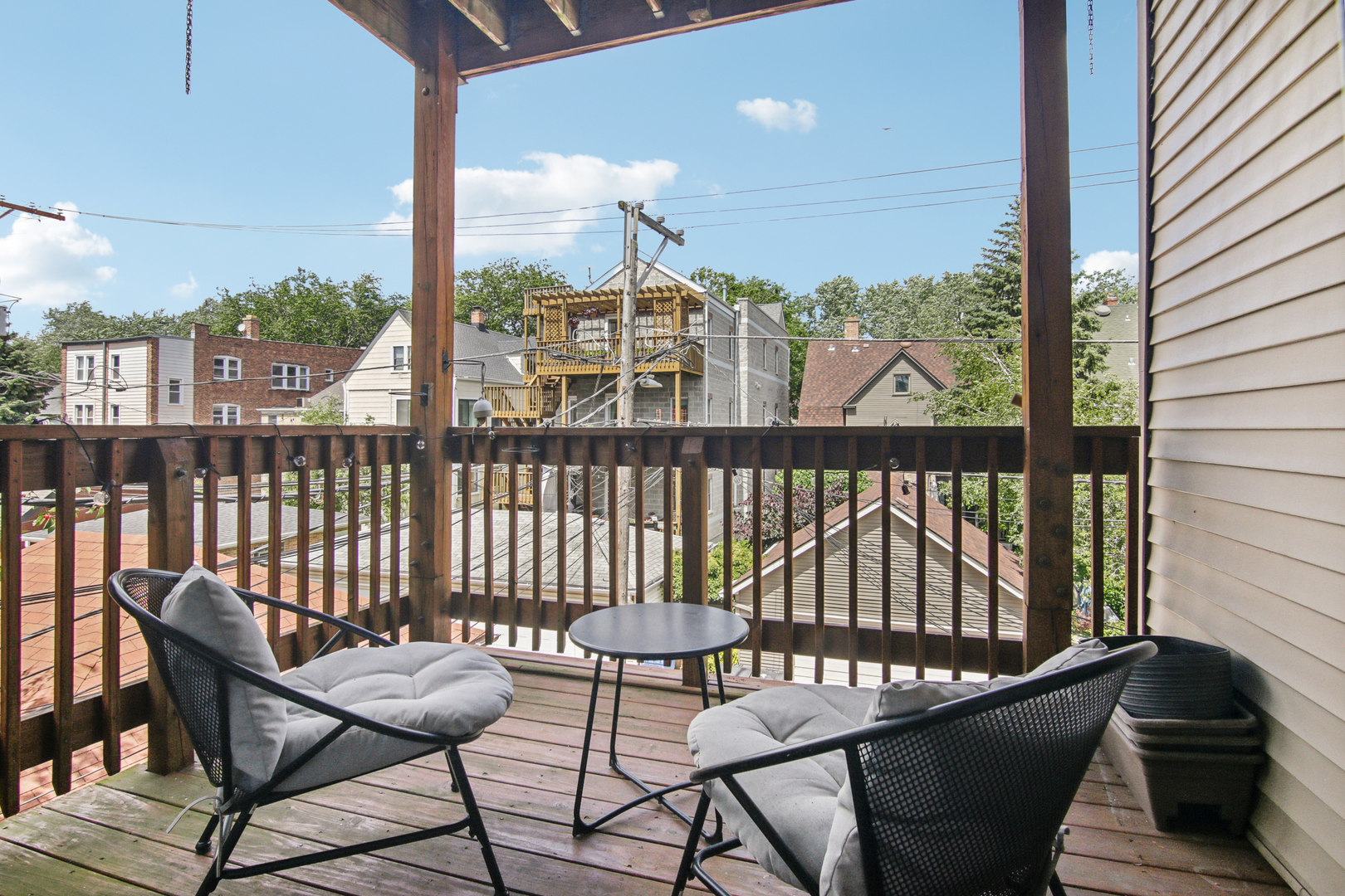 5683 North Ridge Avenue, Unit 2W Chicago, IL 60660 - Photo 22 of 23 a view of a balcony with furniture