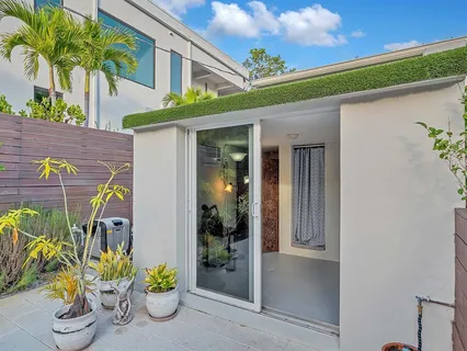 a close up of a flower in a garden