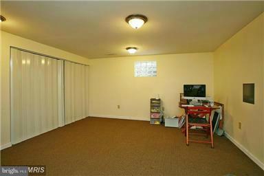 6500 Rockhurst Road Bethesda, MD 20817 - Photo 14 of 18 Basement with versatile space and access backyard