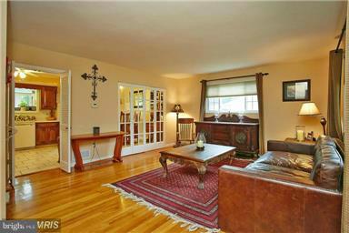 6500 Rockhurst Road Bethesda, MD 20817 - Photo 3 of 18 Living Room with French Doors to Dining Rm