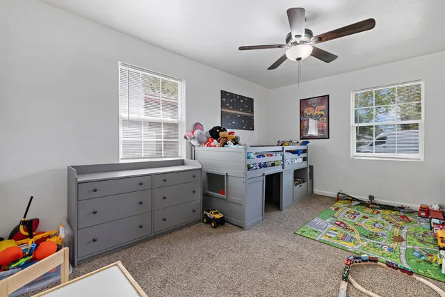 a room with furniture and window