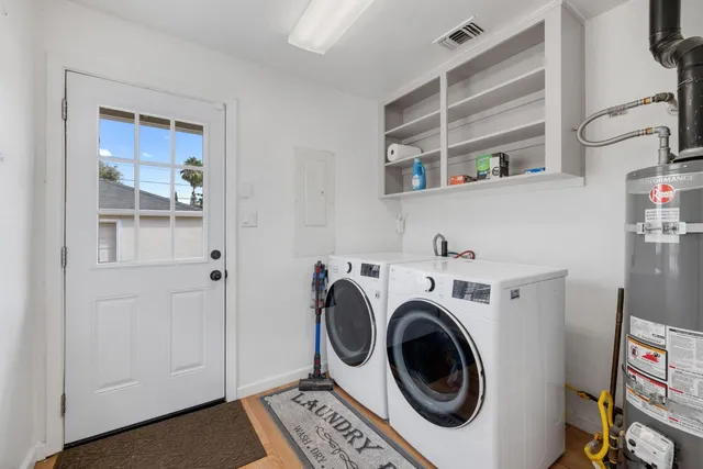 a utility room with dryer and washer