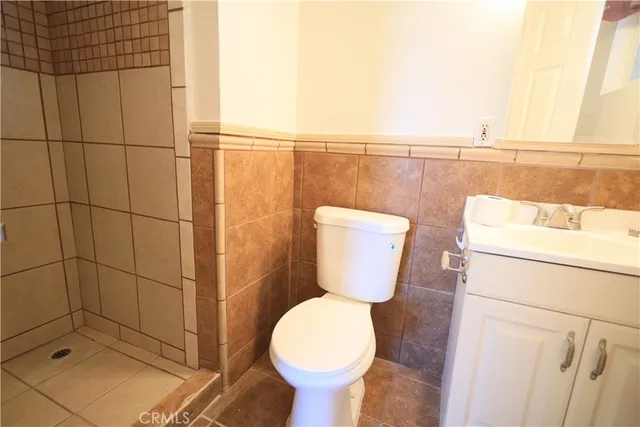 a bathroom with a toilet and a sink