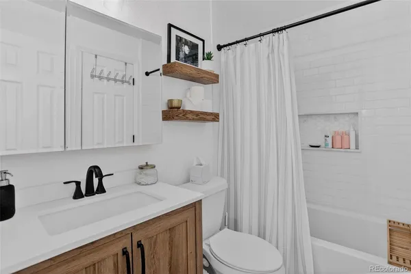 $319,000 | 886 South Reed Court, Unit E, Lakewood, CO 80226