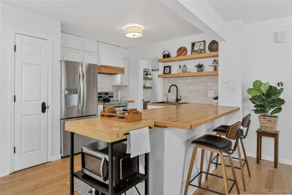 $319,000 | 886 South Reed Court, Unit E, Lakewood, CO 80226