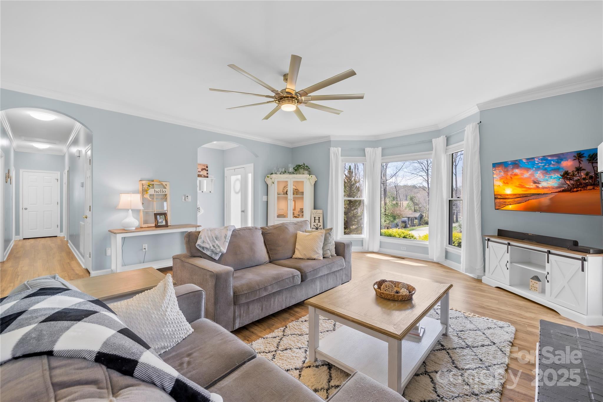 675 Normandy Road Mooresville, NC 28117 - Photo 12 of 36 a living room with furniture and a flat screen tv